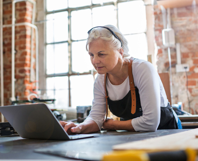 business owner using a laptop